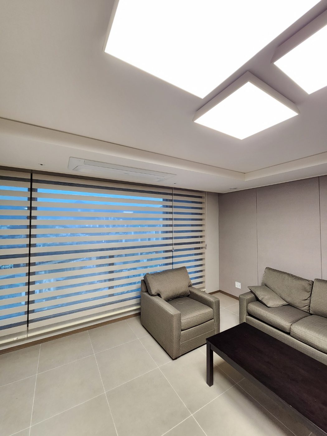 Zebra shades installed in a living room
