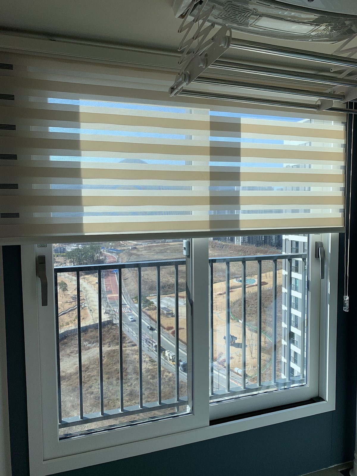Zebra shades on a balcony window